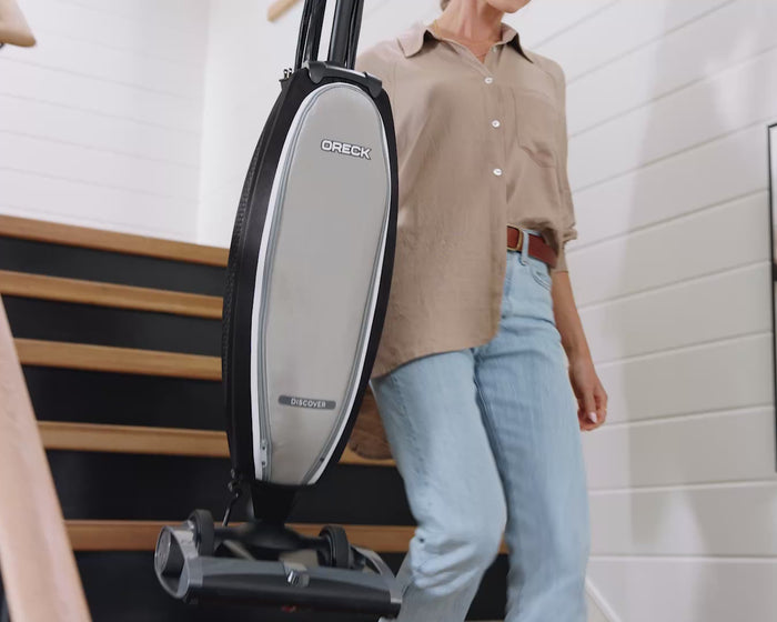 Oreck Discover Vacuum being showcased in a home setting