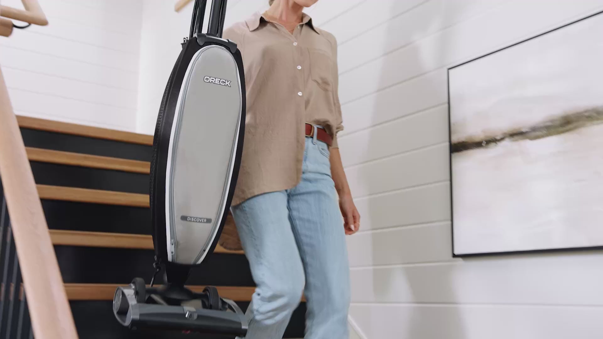 Oreck Discover Vacuum being showcased in a home setting